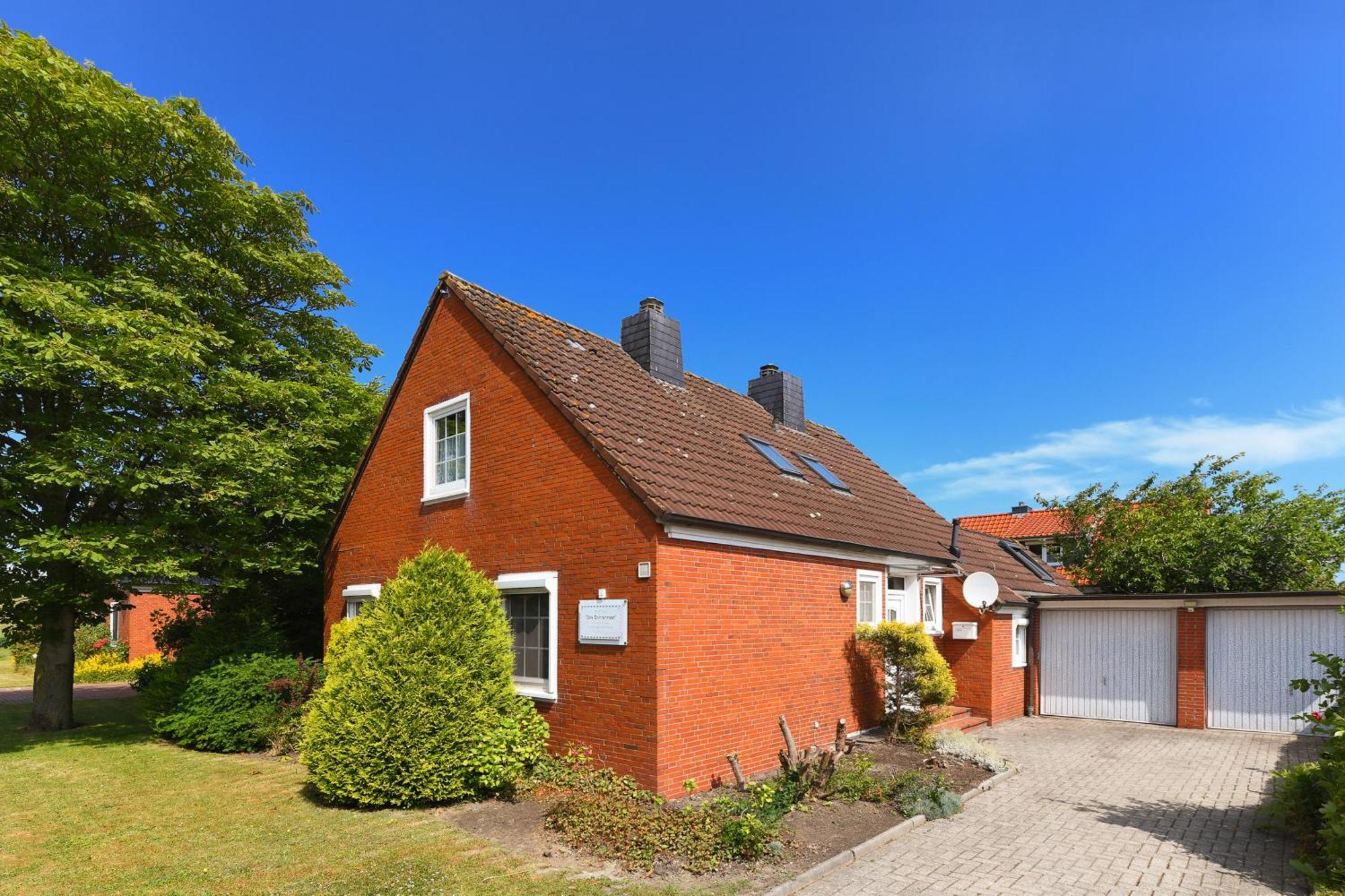 Ferienhaus Dohlennest Carolinensiel Buitenkant foto